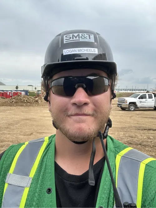 Logan Micheels, Safety Specialist with Safety Management & Training, supporting construction site inspections, job hazard analysis (JHA), and monthly safety consulting services.