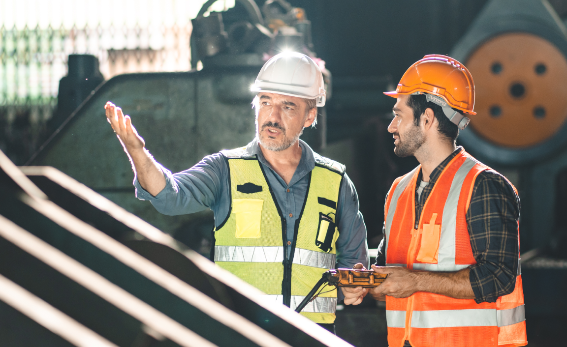 workers-discuss-project Workers discussing project